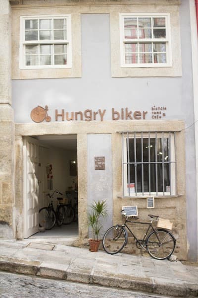 Interior of Floresta cafe by Hungry biker in -263 Porto