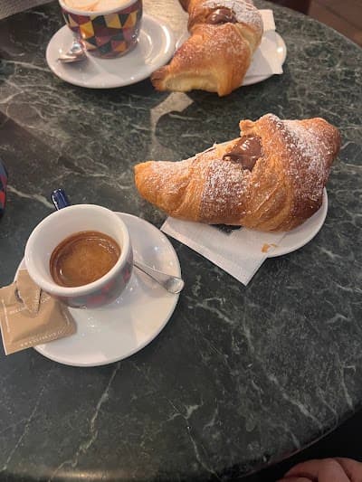 Giornali Con Caffè atmosphere