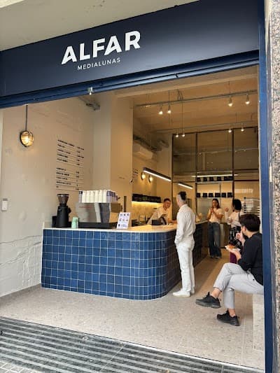 Interior of ALFAR Medialunas & Café in Barcelona