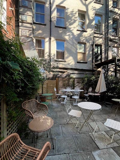 Interior of Sacred Grounds in London W1D 6AE