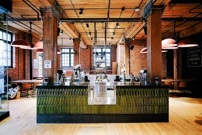 Interior of Phil & Sebastian Coffee Roasters - Simmons Building Cafe in AB T2G 0G1